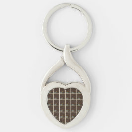 Toffeerosa Twisted Heart Silverfärgad Nyckelring
