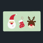 Tomt, julstrumpor och renar fraktsedel<br><div class="desc">En bra etikett med tomten,  en julklapp och en renare. © Mood 4 Cute</div>