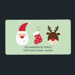 Tomt, julstrumpor och renar fraktsedel<br><div class="desc">En bra etikett med tomten,  en julklapp och en renare. © Mood 4 Cute</div>