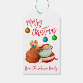 Tomte med en säck julklappar God Jul Presentetikett