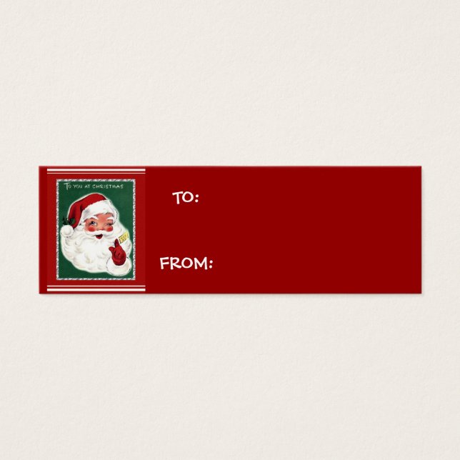 Tomte på grön bakgrund med röda presentbrickor litet visitkort (Framsidan)