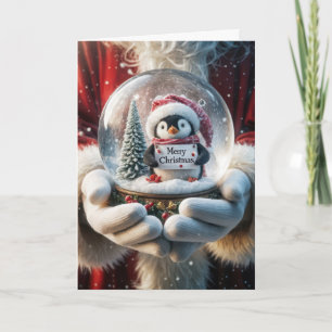 Tomte som håller en snöglob med pingvin helgkort