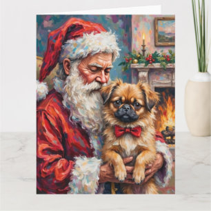 Tomte som håller Pekingeser julkonst Kort