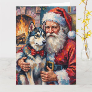Tomte som håller sibirisk husky julkonst kort