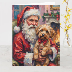 Tomte som håller Yorkipoo julkonst Kort