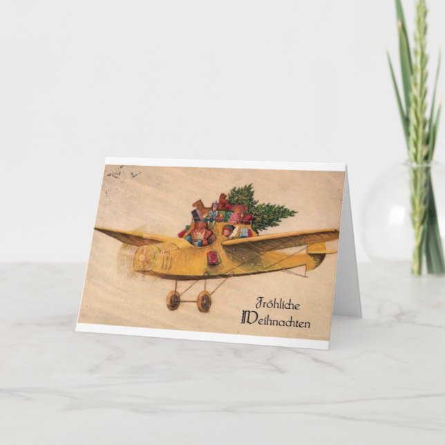 Tomten i flygplan - leksak - Tyskland 1 900-tal #X Helgkort (Framsida)