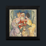 Tomten Kissing Vintage-julkort Minnesask<br><div class="desc">Tomtens kyss är en vintage julillustration baserad på ett 1902-magasin. Den här bilden visar att Jultomten kommer in genom fönstret med en stor julpåse leksaker i handen. Han har träffat två vackra Victorianska kvinnor som ge en stor kyss på kindorna under mistletoe. Vintage-julbilden ser underbar ut för julklappar. En illustratör...</div>
