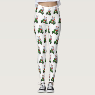 Tomten och Mrs Claus rider en skoter Leggings