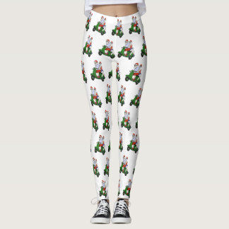Tomten och Mrs Claus rider en skoter Leggings