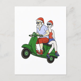 Tomten och Mrs Claus rider en skoter Vykort