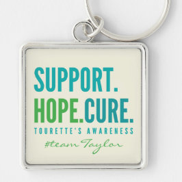 Tourettes anpassade namn stöder hoppingivande bote fyrkantig silverfärgad nyckelring
