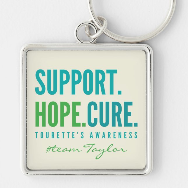 Tourettes anpassade namn stöder hoppingivande bote fyrkantig silverfärgad nyckelring (Framsidan)