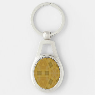 Trä abstrakt pattern.jpg ovalt silverfärgad nyckelring