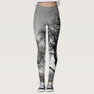 Träd i svartvit damasker lägger benen på ryggen leggings