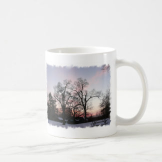 Träd med en solnedgång kaffemugg