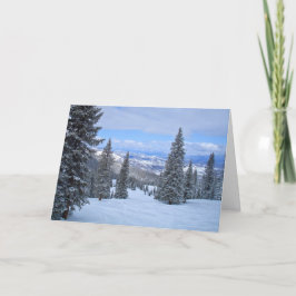 Träd och bergsområden som omfattas av snö helgkort