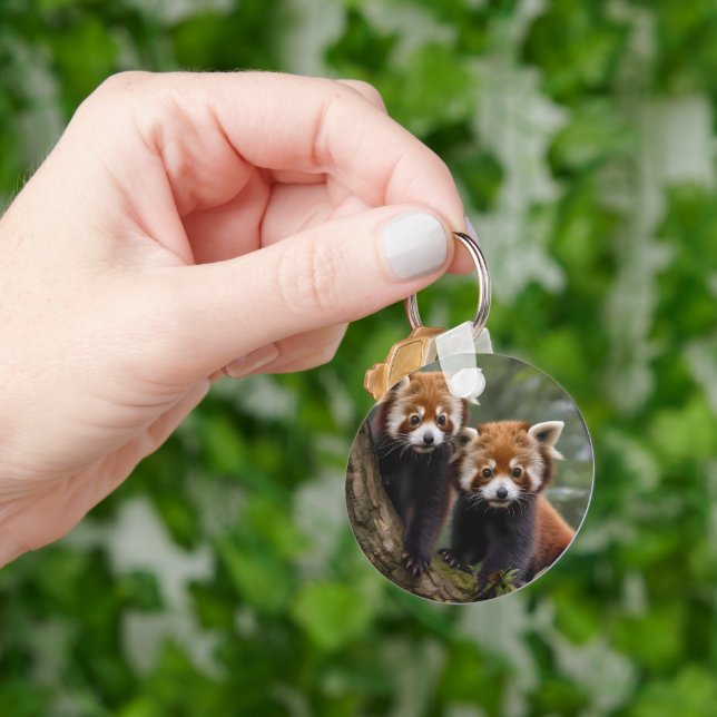 "Träd-top Explorers: Baby Red Pandas Tittar ut Nyckelring (Hand)