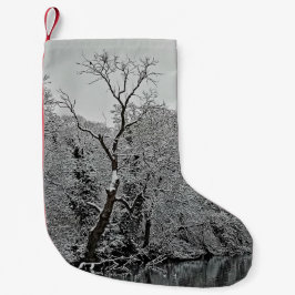 Träd vid vatten liten julstrumpa