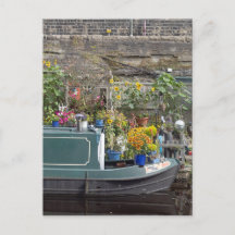 Trädgård och smal båt