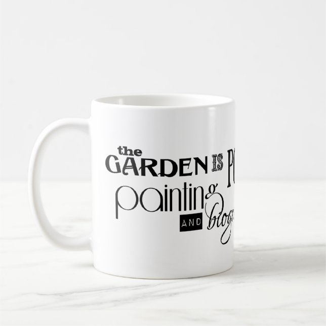 Trädgården är dikt, målning och biografin kaffemugg (Vänster)