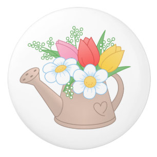 Trädgårds- bevattna kan med blommor knopp