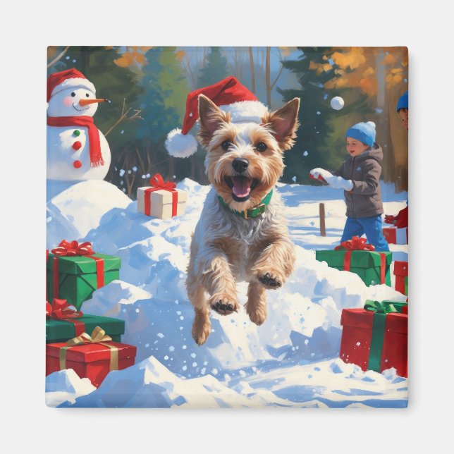 Trådig Rävterrier springer i snö med julhatt Magnet (Framsidan)