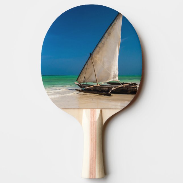 Traditionell fiskebåt på stranden pingisracket (Baksidan)