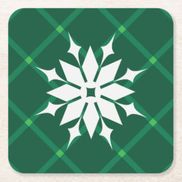 Traditionell grönt som har snöflingat vintertid underlägg papper kvadrat