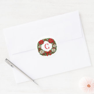 Traditionell julkrans med julstjärna och monogram runt klistermärke