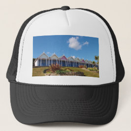 Traditionella brittiska strandstugor keps