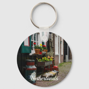 Traditionella nederländska träskor på gatan nyckelring