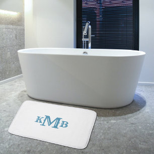 Traditionellt monogrammat blått och vitt badrumsmatta
