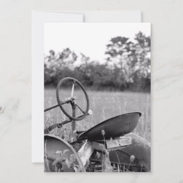 Traktor i högt gräs kort