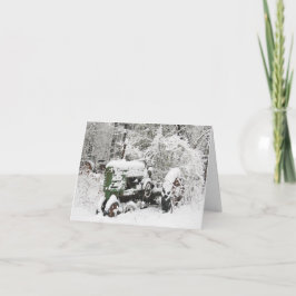 Traktor täckt av snö helgkort