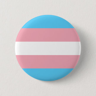 Transgenderflagga knäppas knapp