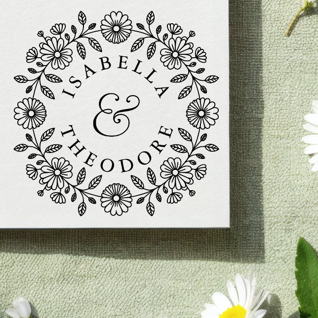 Trästämpel med blomsterkrans och parnamn stämpel (Skapare uppladdad)