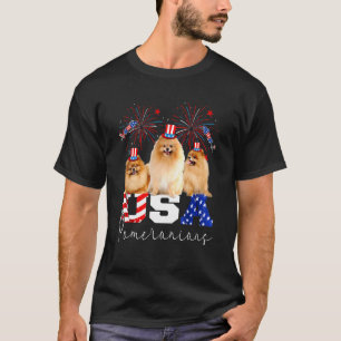 Tre amerikanska pomeranianer som bar den amerikans t shirt