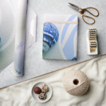 Tre blå snäckor som omsluter pappra