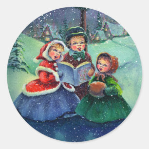 TRE CHRISTMAS CAROLERS AV SHARON SHARPE RUNT KLISTERMÄRKE