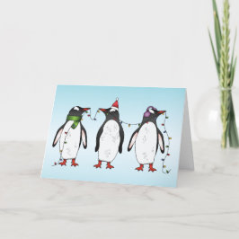 Tre festliga julpingviner illustration helgkort