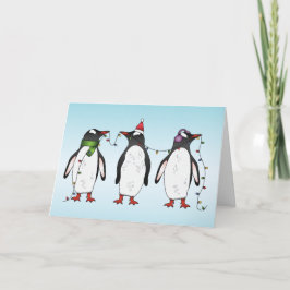Tre festliga julpingviner illustration helgkort