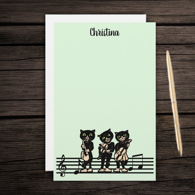 Tre Grönten Black Cat Musician Instruments Brevpapper (Three black cat musicians playing instruments on bar of music notes on green stationery paper pad.)