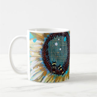 Tre humlor på en solros kaffemugg