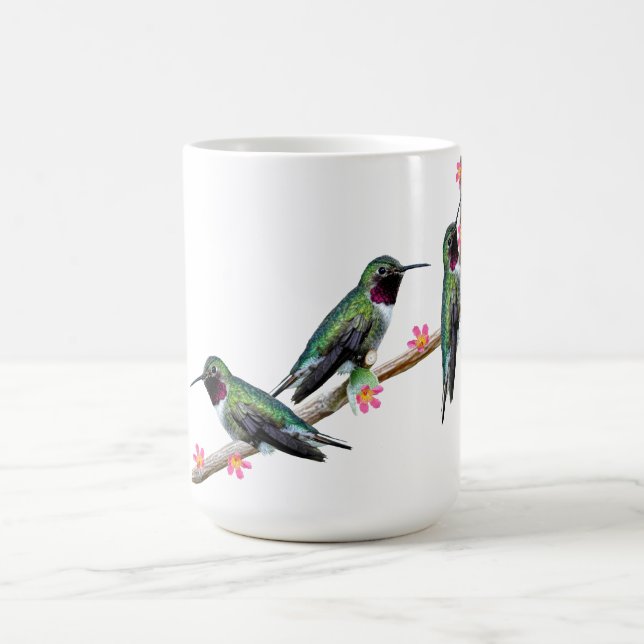 Tre Hummingbird på gren av en blomma Kaffemugg (Center)