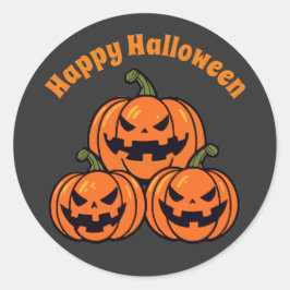 Tre jackar o'lantern pumpor runt klistermärke