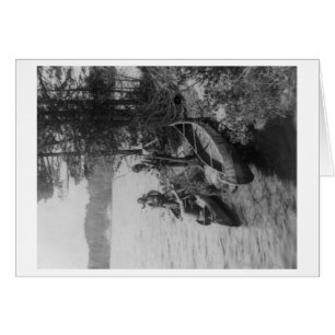Tre jägare med kanoter på Shore Photograph Hälsningskort