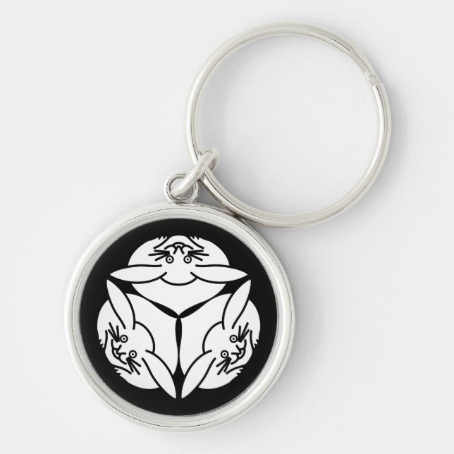 Tre kaniner rund silverfärgad nyckelring (Framsidan)
