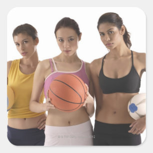 tre kvinnor från olika tävling, som innehar fyrkantigt klistermärke