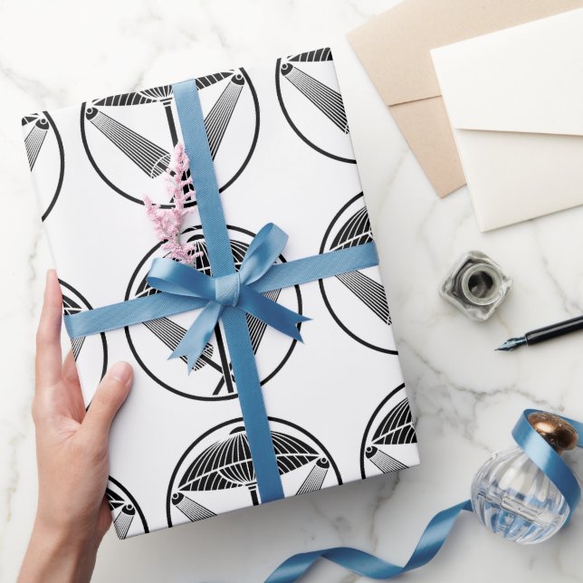 Tre paraplyer i en trådliknande ring presentpapper (Gifting)