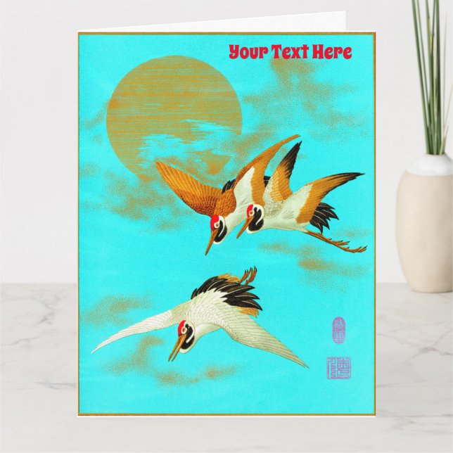 Tre saruskran som flyger framför måne kort (Framsida)